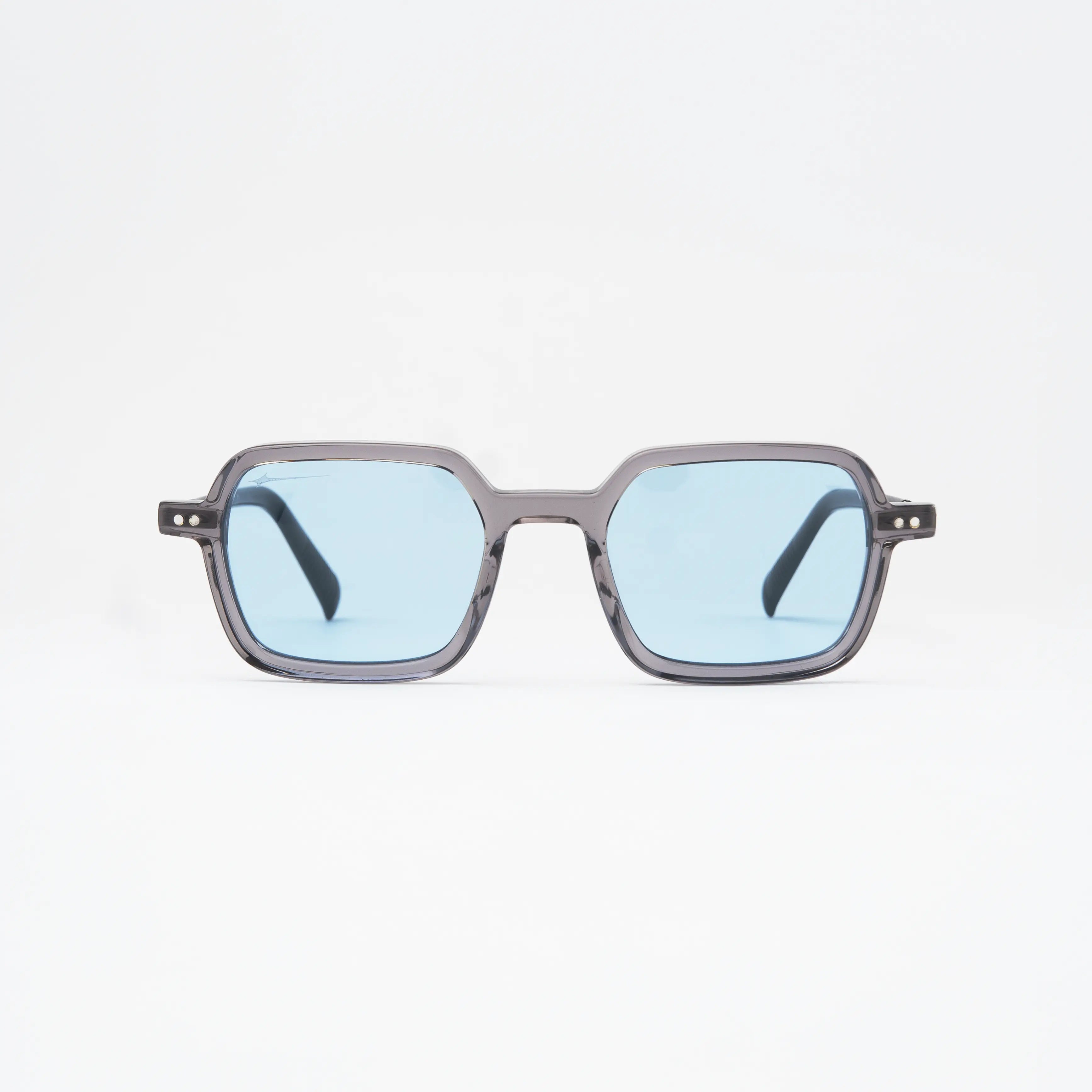 Bold Silver Sunglasses with blue lenses, featuring a modern and sculpted design in premium acetate.