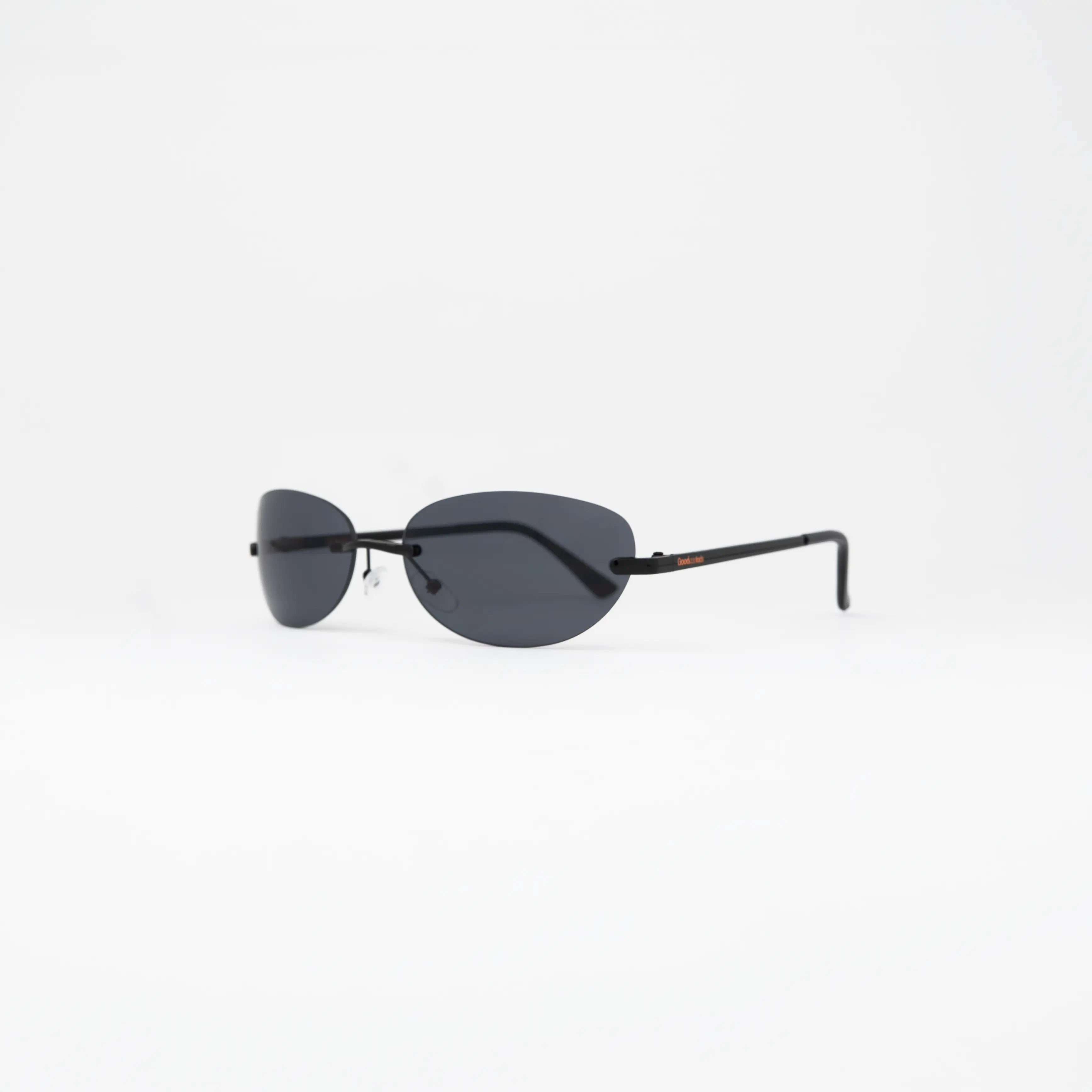 Desire Caviar Black Sunglasses showcasing sleek metal frame and dark lenses for stylish summer look.