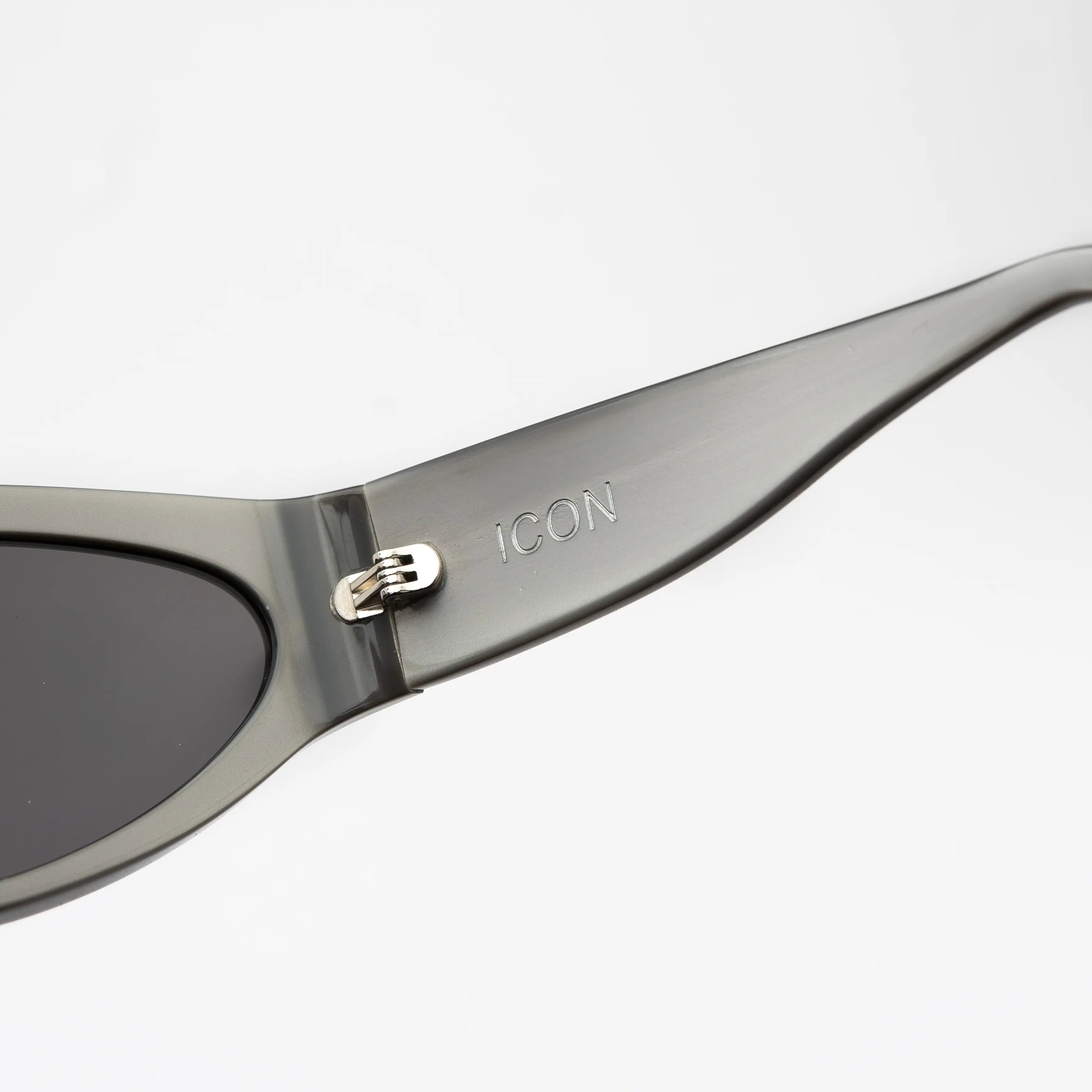 Icon Silver Sunglasses at a three-quarter angle highlighting the aerodynamic shape and silver finish.