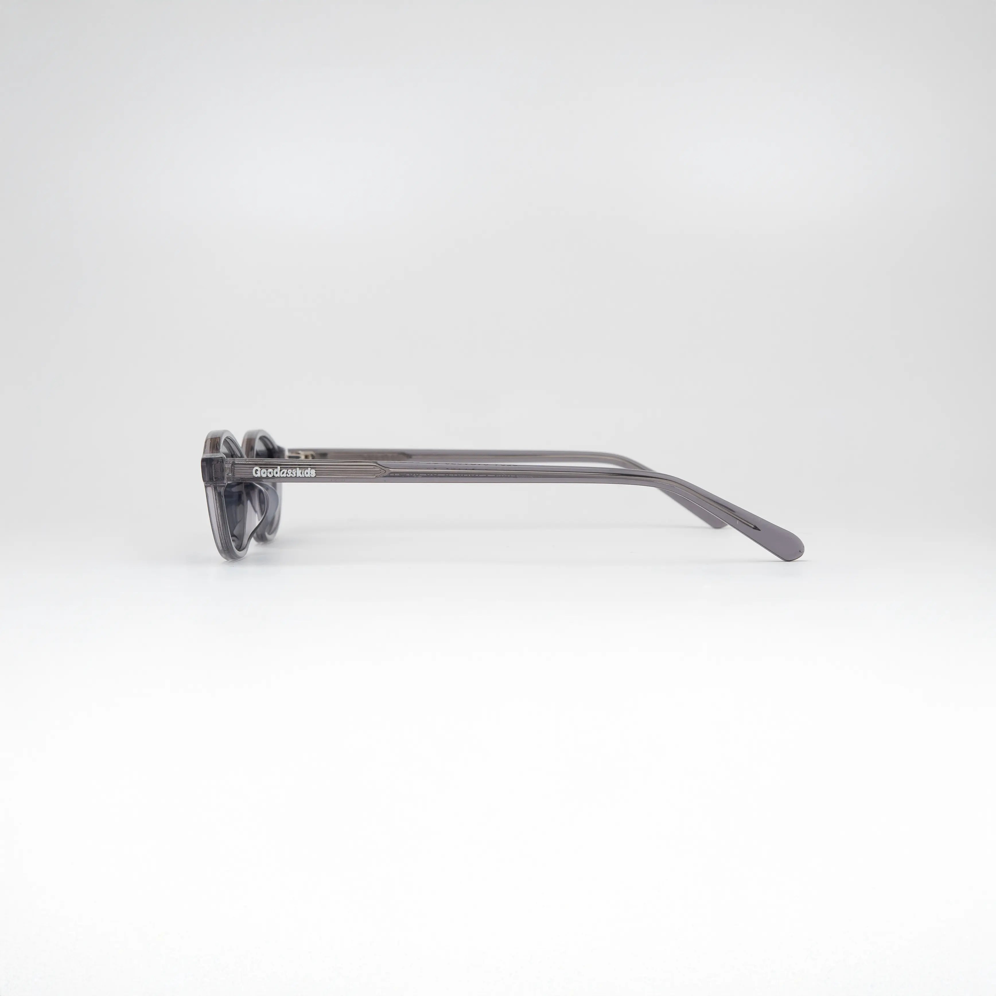 Side view of Timeless Silver Sunglasses showcasing the premium acetate frame and rounded design.